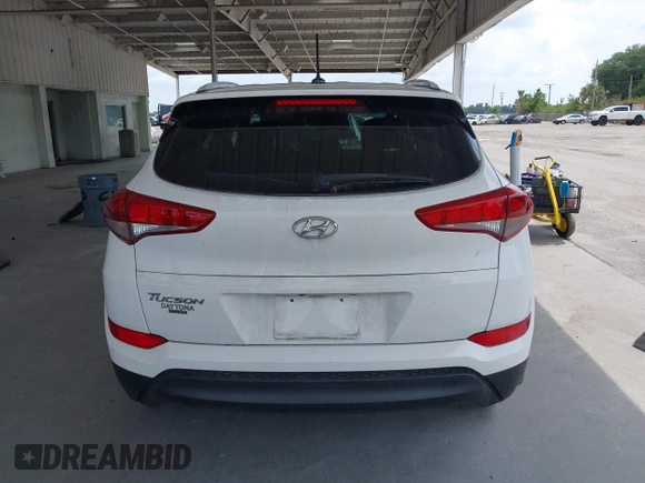2016 Hyundai Tucson SE z VIN KM8J33A48GU192135, wystawiony jako IAAI lot #42216339 z przebiegiem 79 283 mil mil oraz . Historia ofert i sprzedaży dostępna na DreamBid. Obrazek 16.