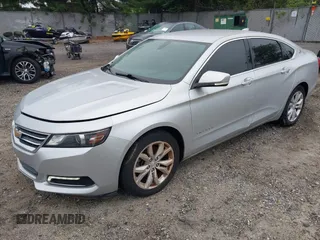2018 Chevrolet Impala LT with VIN 1G1105S39JU135456, listed as a IAAI auction lot 42360696 with 124,176 mi miles and . Bid and sale history available at DreamBid. Image 2.