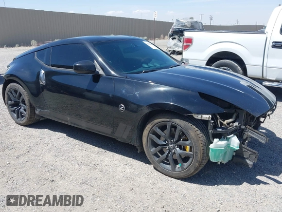 2019 Nissan 370Z Sport Touring with VIN JN1AZ4EH1KM420719, listed as a IAAI auction lot 42096816 with 97,803 mi miles and . Bid and sale history available at DreamBid. Image 1.