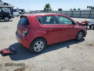 2012 Chevrolet Sonic LT with VIN 1G1JC6SH9C4133623, listed as a Copart auction lot 60065525 with 141,930 mi miles and Salvage title. Bid and sale history available at DreamBid. Image 3.