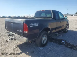 1999 Ford F-150 Work Series with VIN 1FTRX18W9XNA74452, listed as a Copart auction lot 75307294 with 152,631 mi miles and Salvage Title. Bid and sale history available at carsss.com. Image 3.