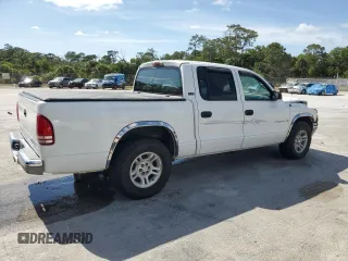 2001 Dodge Dakota Sport z VIN 1B7GL2AN51S192405, wystawiony jako Copart lot #51256284 z przebiegiem 161 387 mil mil oraz Szkoda całkowita • Salvage title. Historia ofert i sprzedaży dostępna na DreamBid. Obrazek 3.