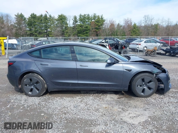 2023 Tesla Model 3 z VIN 5YJ3E1EA5PF451085, wystawiony jako IAAI lot #41941655 z przebiegiem 56 532 mil mil oraz . Historia ofert i sprzedaży dostępna na DreamBid. Obrazek 13.