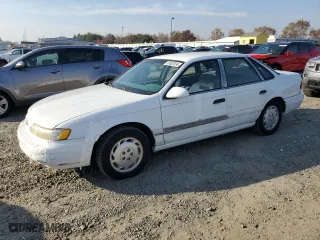 1993 Ford Taurus GL with VIN 1FALP5247PG143248, listed as a Copart auction lot 83922634 with 605,096 mi miles and Salvage Title. Bid and sale history available at carsss.com. Image 1.