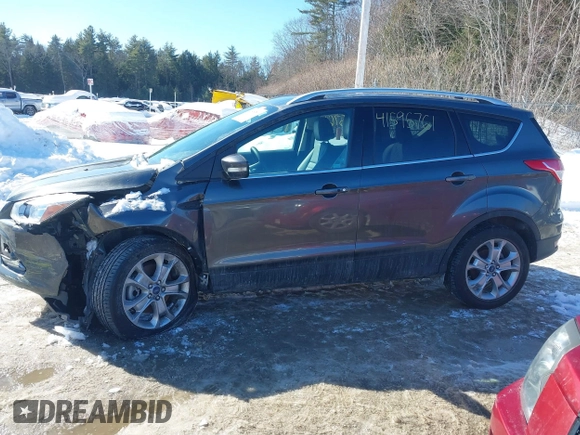 2015 Ford Escape Titanium with VIN 1FMCU9JX6FUB86304, listed as a IAAI auction lot 41595761 with 104,317 mi miles and . Bid and sale history available at DreamBid. Image 14.