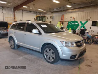 2014 Dodge Journey Limited with VIN 3C4PDDDG4ET175007, listed as a IAAI auction lot 41888742 with 218,585 mi miles and . Bid and sale history available at carsss.com. Image 1.