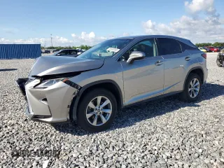 2019 Lexus RX 350 z VIN 2T2ZZMCA4KC144342, wystawiony jako Copart lot #56862595 z przebiegiem 127 846 mil mil oraz Nie do naprawy • Non repairable. Historia ofert i sprzedaży dostępna na DreamBid. Obrazek 1.