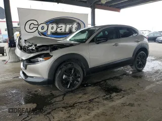 2024 Mazda CX-30 S Select Sport z VIN 3MVDMBBM7RM628924, wystawiony jako Copart lot #60054295 z przebiegiem 35 300 mil mil oraz Czysty tytuł • Clean title. Historia ofert i sprzedaży dostępna na DreamBid. Obrazek 1.