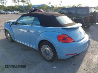 2013 Volkswagen Beetle 2.5L with VIN 3VW5P7AT0DM812482, listed as a IAAI auction lot 42103987 with 105,513 mi miles and . Bid and sale history available at DreamBid. Image 3.