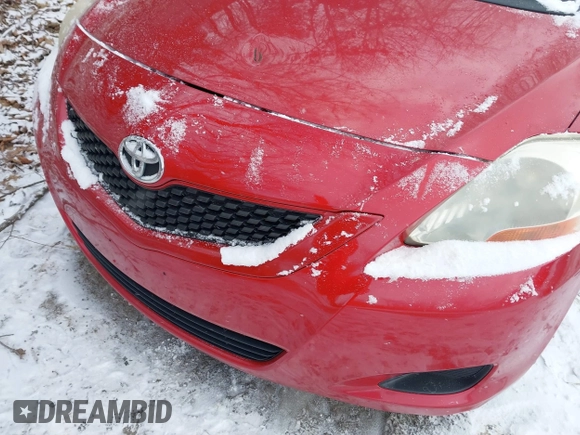 2009 Toyota Yaris with VIN JTDBT903191338948, listed as a IAAI auction lot 41630265 with 230,360 mi miles. Bid and sale history available at carsss.com. Image 13.