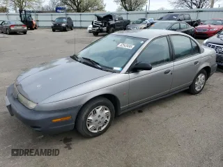 1999 Saturn SL with VIN 1G8ZH5286XZ266266, listed as a Copart auction lot 52543495 with 220,622 mi miles and Salvage Title. Bid and sale history available at carsss.com. Image 1.