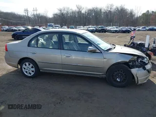 2003 Honda Civic EX with VIN 2HGES26733H626191, listed as a IAAI auction lot 41623055 with 107,125 mi miles and . Bid and sale history available at DreamBid. Image 13.