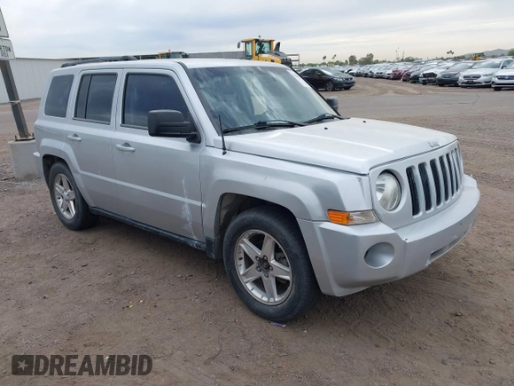 2010 Jeep Patriot Sport with VIN 1J4NT2GB7AD529286, listed as a IAAI auction lot 42020227 with 158,401 mi miles. Bid and sale history available at carsss.com. Image 1.