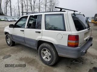 1997 Jeep Grand Cherokee Laredo with VIN 1J4GZ58SXVC597519, listed as a Copart auction lot 88437475 with 172,051 mi miles and Salvage Title. Bid and sale history available at carsss.com. Image 2.