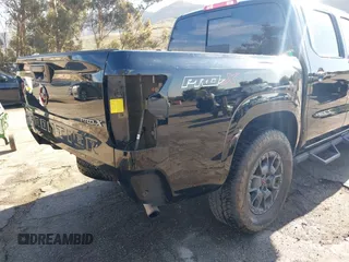 2023 Nissan Frontier Pro-X with VIN 1N6ED1EJ6PN619651, listed as a IAAI auction lot 41838415 with 69,819 mi miles and . Bid and sale history available at DreamBid. Image 6.
