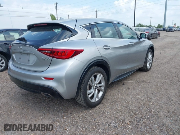 2018 Infiniti QX30 z VIN SJKCH5CP0JA002335, wystawiony jako IAAI lot #42114171 z przebiegiem 87 550 mil mil oraz . Historia ofert i sprzedaży dostępna na DreamBid. Obrazek 4.