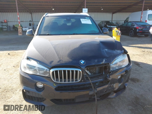 2017 BMW X5 xDrive50i z VIN 5UXKR6C56H0J83813, wystawiony jako IAAI lot #41398752 z przebiegiem 105 239 mil mil oraz . Historia ofert i sprzedaży dostępna na DreamBid. Obrazek 13.