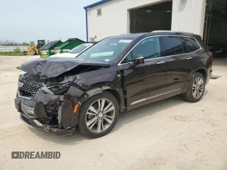 2020 Cadillac XT6 AWD Premium Luxury with VIN 1GYKPDRS4LZ129224, listed as a Copart auction lot 60328745 with 76,290 mi miles and Salvage title. Bid and sale history available at DreamBid. Image 1.
