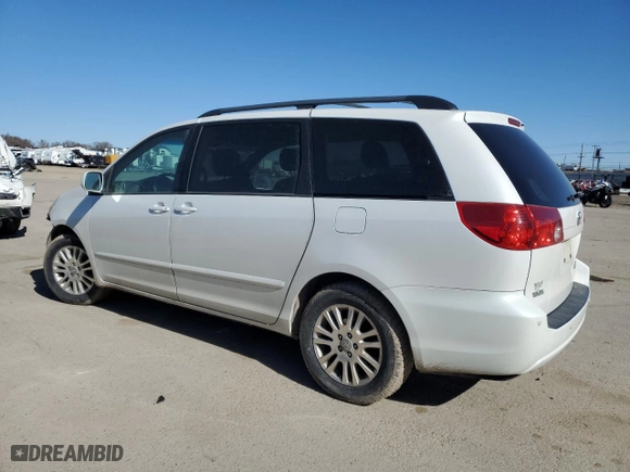 2010 Toyota Sienna XLE with VIN 5TDYK4CC8AS311023, listed as a Copart auction lot 47574285 with 209,186 mi miles and Salvage Title. Bid and sale history available at carsss.com. Image 2.