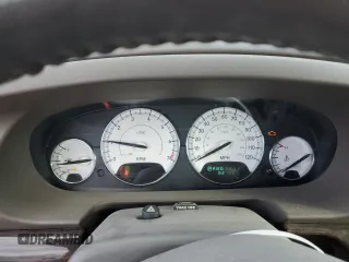 2004 Chrysler Sebring Limited z VIN 1C3EL65R14N257513, wystawiony jako Copart lot #84049844 z przebiegiem 82 402 mil mil oraz Szkoda całkowita • Salvage title. Historia ofert i sprzedaży dostępna na DreamBid. Obrazek 9.