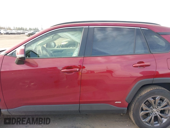 2023 Toyota RAV4 Hybrid XLE Premium z VIN JTMB6RFV8PD114927, wystawiony jako IAAI lot #41844127 z przebiegiem 14 582 mil mil oraz . Historia ofert i sprzedaży dostępna na DreamBid. Obrazek 14.