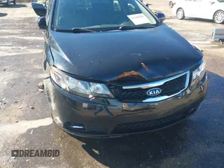 2012 Kia Forte SX with VIN KNAFW4A3XC5563571, listed as a IAAI auction lot 41590629 with 115,993 mi miles. Bid and sale history available at carsss.com. Image 6.