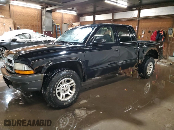 2004 Dodge Dakota Sport z VIN 1D7HG38KX4S782636, wystawiony jako Copart lot #88805195 z przebiegiem 151 620 mil mil oraz Szkoda całkowita • Salvage title. Historia ofert i sprzedaży dostępna na DreamBid. Obrazek 1.
