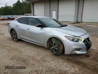 2018 Nissan Maxima SV with VIN 1N4AA6AP7JC375132, listed as a Copart auction lot 52005945 with 119,375 mi miles and Salvage title. Bid and sale history available at DreamBid. Image 4.