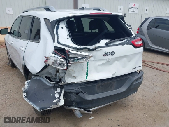2014 Jeep Cherokee Limited with VIN 1C4PJLDB2EW173127, listed as a IAAI auction lot 42413180 with 107,871 mi miles and . Bid and sale history available at DreamBid. Image 6.