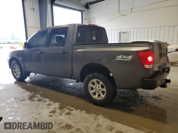 2004 Nissan Titan LE with VIN 1N6AA07B74N507976, listed as a Copart auction lot 56402785 with 181,253 mi miles and Salvage title. Bid and sale history available at DreamBid. Image 2.