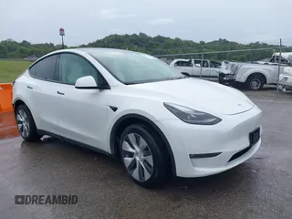 2023 Tesla Model Y Long Range with VIN 7SAYGDEE5PF712612, listed as a IAAI auction lot 40392709 with 31,009 mi miles and . Bid and sale history available at DreamBid. Image 1.