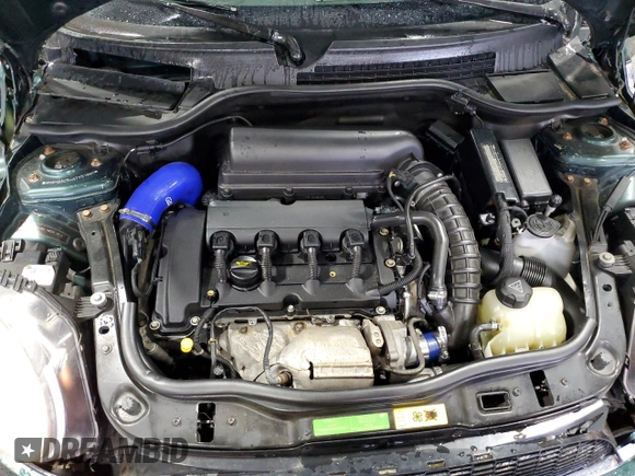 2010 MINI Convertible S with VIN WMWMS3C54ATY51980, listed as a Copart auction lot 56589265 with 147,136 mi miles and Salvage title. Bid and sale history available at DreamBid. Image 11.
