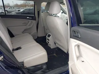 2023 Volkswagen Tiguan SE z VIN 3VVMB7AX3PM006867, wystawiony jako IAAI lot #40793976 z przebiegiem 29 648 mil mil oraz . Historia ofert i sprzedaży dostępna na DreamBid. Obrazek 8.
