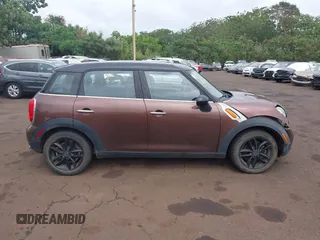 2014 MINI Countryman with VIN WMWZB3C51EWR36737, listed as a IAAI auction lot 41741248 with 69,717 mi miles and . Bid and sale history available at DreamBid. Image 14.