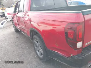 2022 Honda Ridgeline RTL-E with VIN 5FPYK3F74NB011358, listed as a IAAI auction lot 41431157 with 26,116 mi miles and . Bid and sale history available at DreamBid. Image 18.