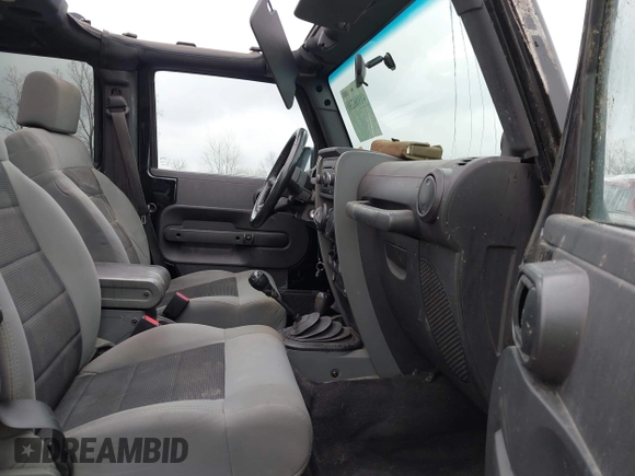 2008 Jeep Wrangler Unlimited X with VIN 1J4GA39138L641138, listed as a IAAI auction lot 41986230 with 215,026 mi miles. Bid and sale history available at carsss.com. Image 5.
