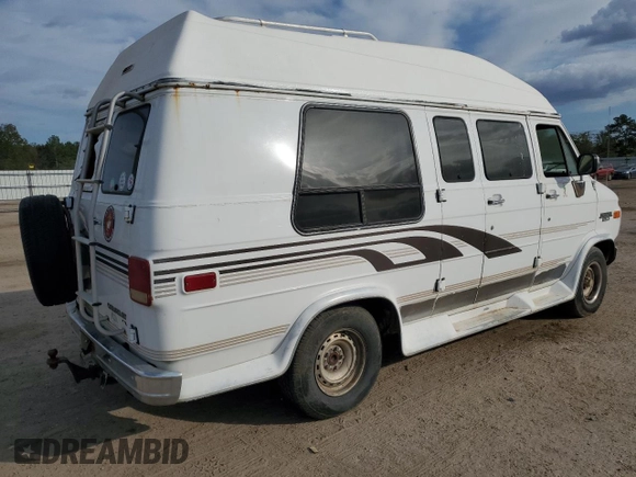 1995 Chevrolet Chevy Van с VIN 1GBEG25K1SF128372, выставлен на аукционе Copart как лот 78600654 с пробегом 183 522 миль миль и Списание • Salvage title. История ставок и продаж доступна на DreamBid. Изображение 3.