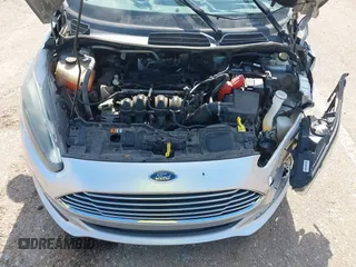 2016 Ford Fiesta S z VIN 3FADP4AJ6GM123343, wystawiony jako IAAI lot #42136294 z przebiegiem 100 206 mil mil oraz . Historia ofert i sprzedaży dostępna na DreamBid. Obrazek 10.