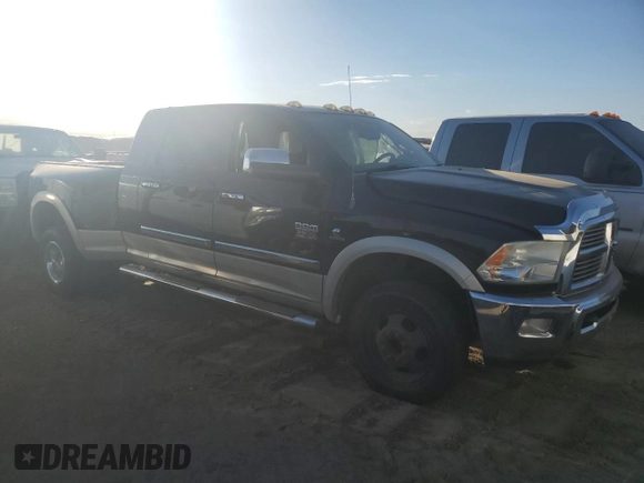 2010 Dodge 3500 Laramie z VIN 3D73Y4HL3AG156807, wystawiony jako Copart lot #73199284 z przebiegiem 268 617 mil mil oraz Szkody całkowita. Historia ofert i sprzedaży dostępna na DreamBid. Obrazek 4.