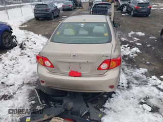 2009 Toyota Corolla with VIN 1NXBU40E19Z052903, listed as a IAAI auction lot 41305719 with 141,625 mi miles and . Bid and sale history available at carsss.com. Image 17.