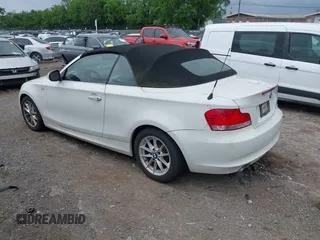 2010 BMW 1 Series 128i with VIN WBAUL7C52AVJ77773, listed as a IAAI auction lot 42146261 with 91,777 mi miles and . Bid and sale history available at carsss.com. Image 3.
