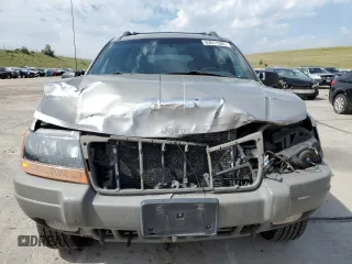 2000 Jeep Grand Cherokee Laredo with VIN 1J4GW48N1YC324356, listed as a Copart auction lot 62011305 with 242,322 mi miles and Salvage title. Bid and sale history available at DreamBid. Image 5.