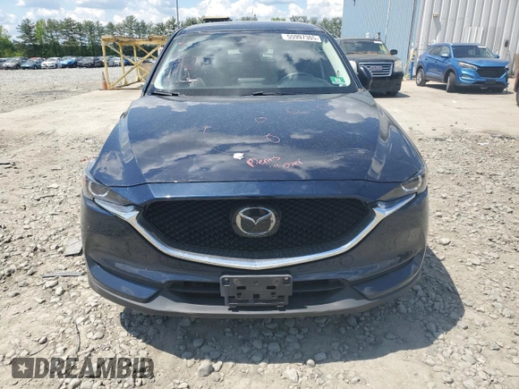 2018 Mazda CX-5 Touring with VIN JM3KFBCMXJ0460020, listed as a Copart auction lot 55997305 with 56,361 mi miles and Salvage Title. Bid and sale history available at DreamBid. Image 5.