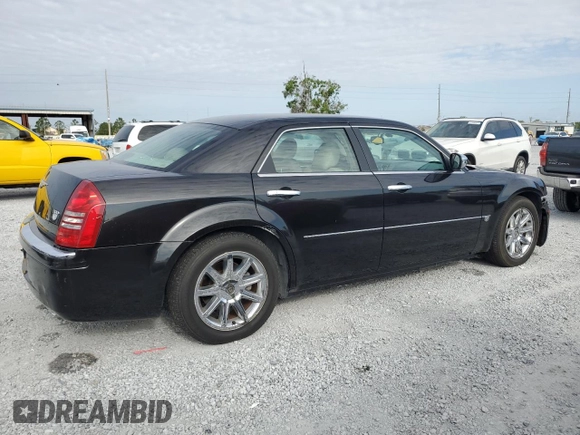 2005 Chrysler 300 C with VIN 2C3AA63H15H525775, listed as a Copart auction lot 52018135 with 59,098 mi miles and Salvage Title. Bid and sale history available at DreamBid. Image 3.