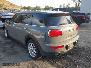 2019 MINI Clubman Cooper with VIN WMWLN5C59K2G82399, listed as a IAAI auction lot 41349514 with 64,235 mi miles. Bid and sale history available at carsss.com. Image 3.