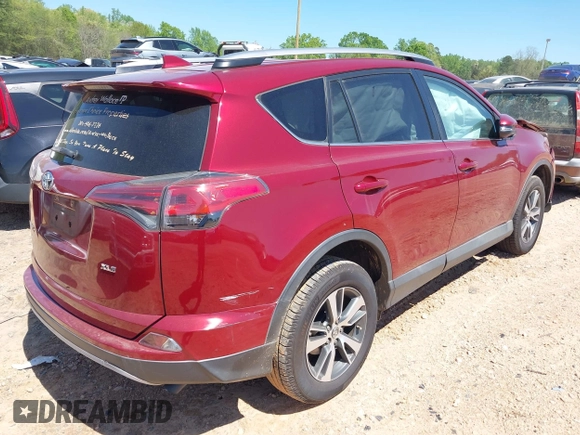 2018 Toyota RAV4 XLE with VIN 2T3WFREVXJW434957, listed as a IAAI auction lot 42002561 with 111,590 mi miles and . Bid and sale history available at carsss.com. Image 4.