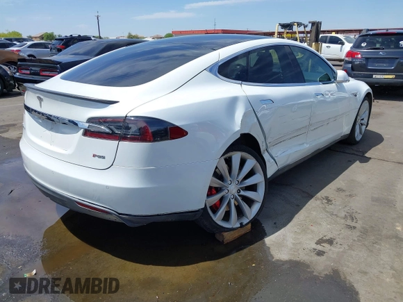 2014 Tesla Model S 60 z VIN 5YJSA1H13EFP33659, wystawiony jako IAAI lot #42101491 z przebiegiem 113 460 mil mil oraz . Historia ofert i sprzedaży dostępna na DreamBid. Obrazek 4.