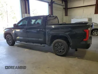 2023 Toyota Tundra SR z VIN 5TFKB5DB8PX113093, wystawiony jako Copart lot #80488324 z przebiegiem 24 200 mil mil oraz Szkoda całkowita • Salvage title. Historia ofert i sprzedaży dostępna na DreamBid. Obrazek 2.