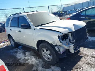 2009 Ford Escape XLS with VIN 1FMCU02729KA51377, listed as a IAAI auction lot 41404063 with 104,582 mi miles and . Bid and sale history available at DreamBid. Image 1.