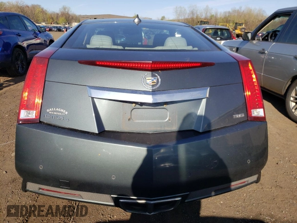2013 Cadillac CTS Coupe Performance with VIN 1G6DL1E32D0123731, listed as a Copart auction lot 53700945 with 128,733 mi miles and Salvage Title. Bid and sale history available at carsss.com. Image 6.
